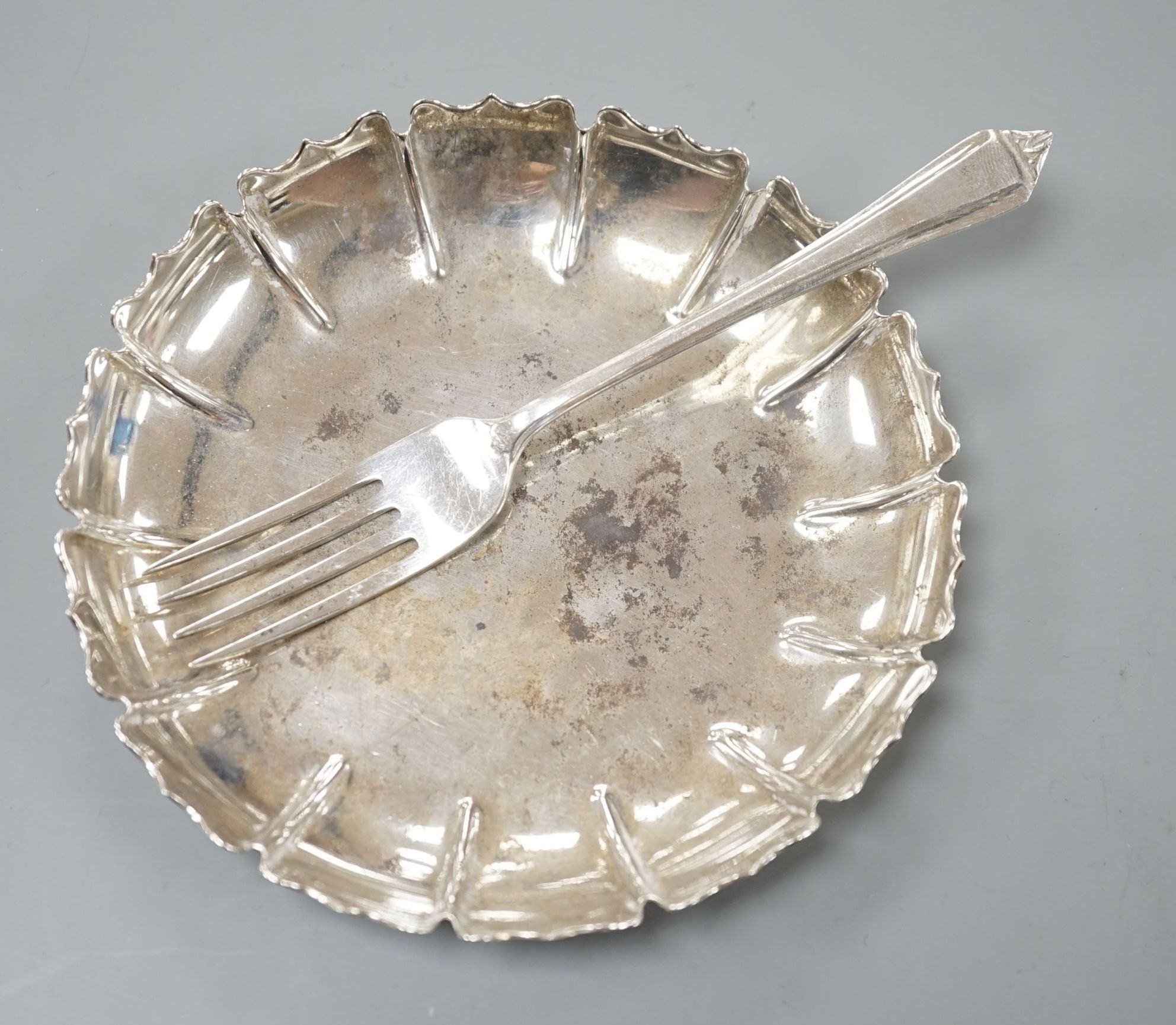 A 1960's silver dish, by C.J. Vander Ltd, 11.6cm and a silver fork, 4oz.